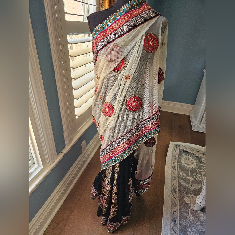 Elegant White and Pink Embroidered Saree with Teal and Gold Accents